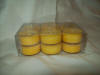 Box of 12 soy tealight candles available in normal fragrances and colors.
